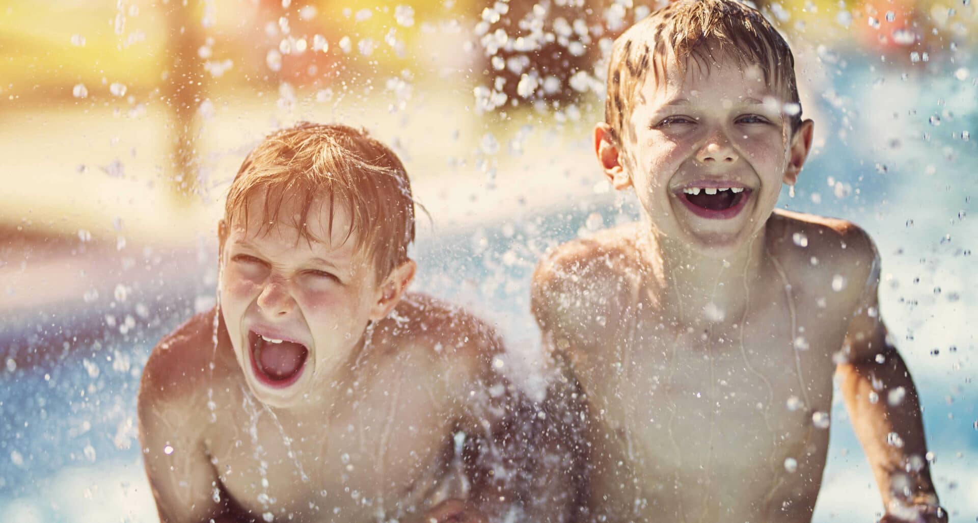 Little boys having fun in waterpark